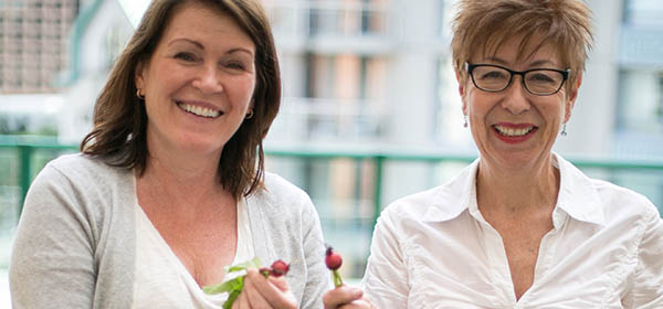 From left, Mary Lu Merritt and Marion Tompkins say they helped organize a herb garden at their Eau Claire condo in an effort to create a better sense of community and to 'get their hands dirty.' Photo by Michelle Hofer/For CREB®Now