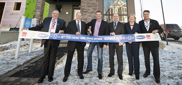 Mattamy unveiled its first net-zero home in Cityscape late last year. Pictured, from left, is Andy Goyda of Owens Corning Canada with Mattamy Homes representatives Don Barrineau, Brad Carr and Warren Saunders, as well as Donna Moore of the Canadian Home Builders’ Association - Calgary Region and
Salvatore Ciarlo of Owens Corning Canada.