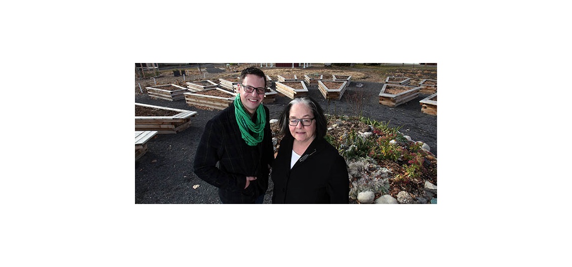 Bev Sandalack, associate dean (academic) with the University of Calgary's Faculty of Design, with Parkdale Community Association president Colin Brandt at the Parkdale Garden. Photo by Wil Andruschak/For CREB®Now