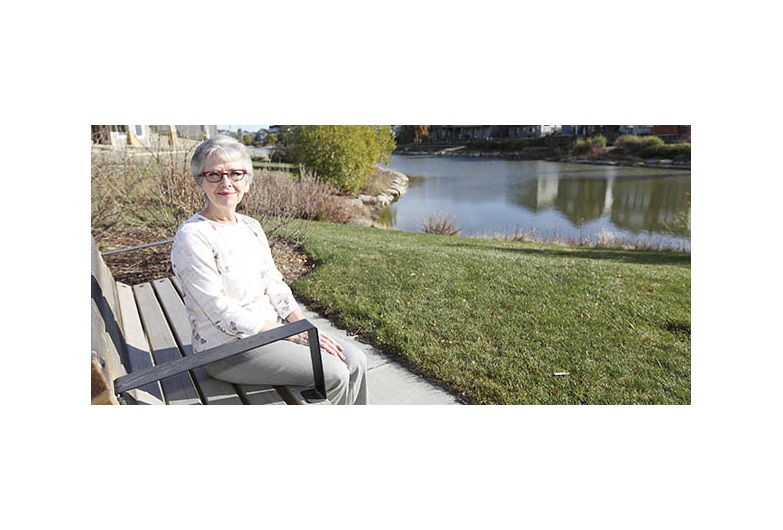Convenience, location and amenities drew Laura Routledge, 61, from her larger home in Chestermere to the Bayside Rivairo Townhome Community in Airdrie. Photo by Carl Patzel/For CREB®Now