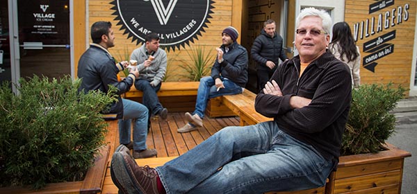 Richard White, a Calgary-based columnist who writes on urban development, says The Village Ice Cream patio on 10th Avenue S.E. is a good example of a parklet in action. Photo by Michelle Hofer/for CREB®Now.
