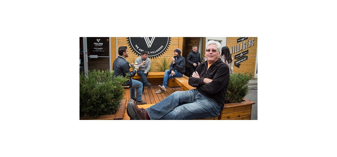 Richard White, a Calgary-based columnist who writes on urban development, says The Village Ice Cream patio on 10th Avenue S.E. is a good example of a parklet in action. Photo by Michelle Hofer/for CREB®Now.