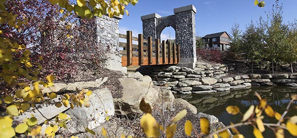 Melcor Developments coverted public space in its King's Hieghts development on Airdrie's east side into canals and bridges for community residents. Photo by Carl Patzel/For CREB®Now.