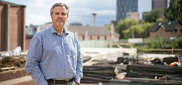 Gary Beyer, president of The Providence Group, outside the company's V & V (Victory&Venture) project in Bridgeland, which offers units as small as 470 square feet. Photo by Michelle Hofer/For CREB®Now