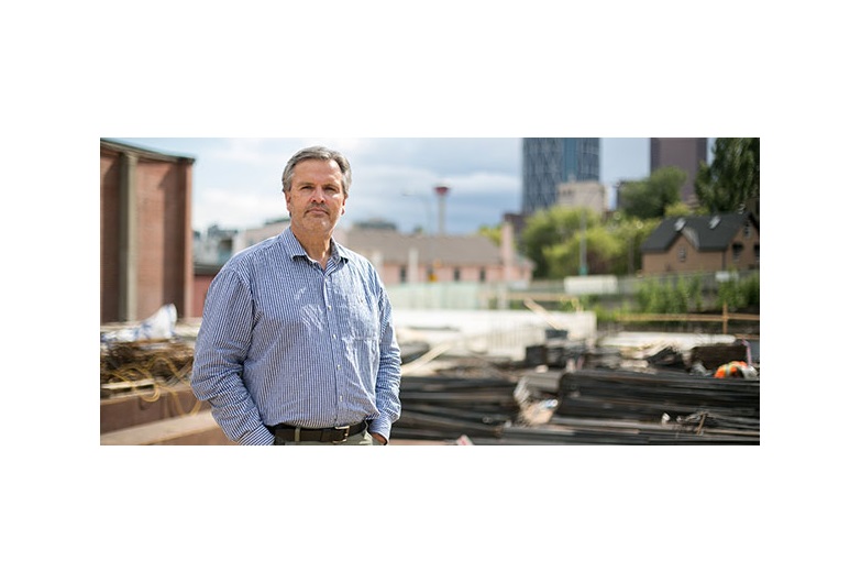 Gary Beyer, president of The Providence Group, outside the company's V & V (Victory&Venture) project in Bridgeland, which offers units as small as 470 square feet. Photo by Michelle Hofer/For CREB®Now