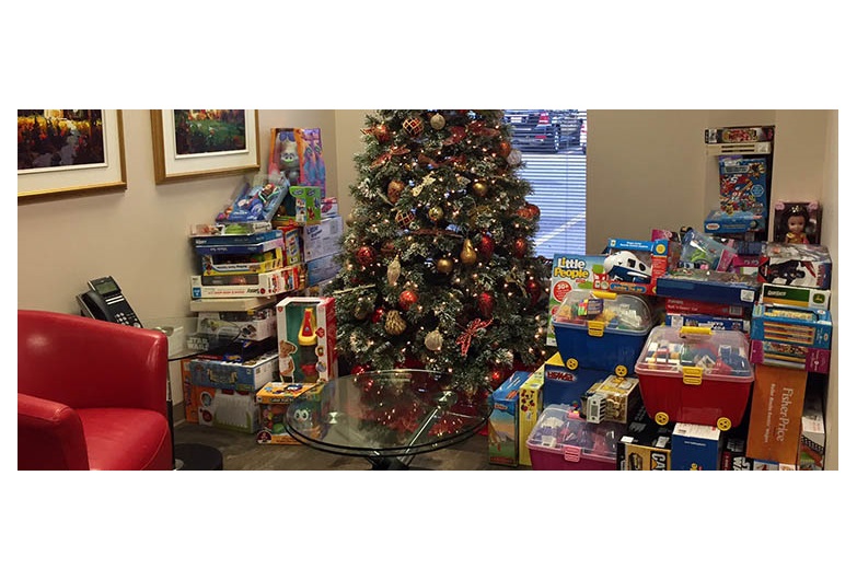 Royal LePage Benchmark is collecting new unwrapped toys and cash donations for the Children’s Cottage Society and Brenda's House until Dec. 9. Photo courtesy Royal LePage Benchmark
