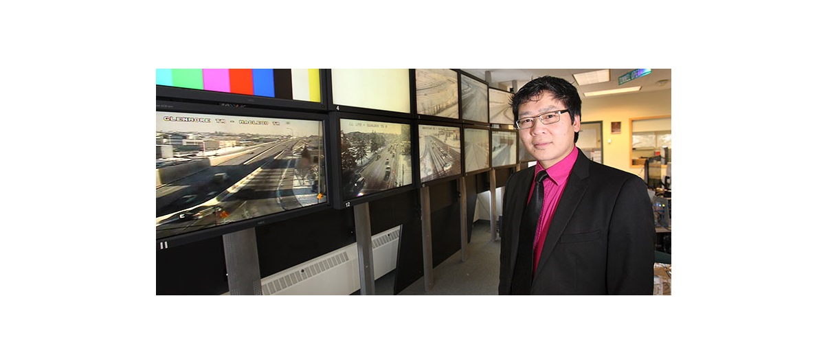 Yeatland Wong, senior engineer for intelligent transportation systems with the City of Calgary, at the traffic management centre along Spiller Road S.E. Photo by Wil Andruschak/For CREB®Now