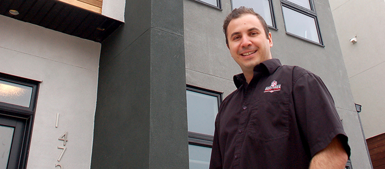 Brett Taylor is owner of Red Tree Custom Homes and shows a three-storey townhome show suite in Montgomery on 4727 17th Ave. N.W. Taylor said a third floor provides space for luxury features. Photo by Lindsay Holden/For CREB®Now.