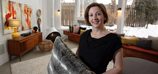 January 22 2016, Calgary AB, Pam Fieber of Edit Home Staging poses with a accent pillow in a Bow Crescent home represented by Perry Lagler-Remax (Wil Andruschak/CREB NOW)