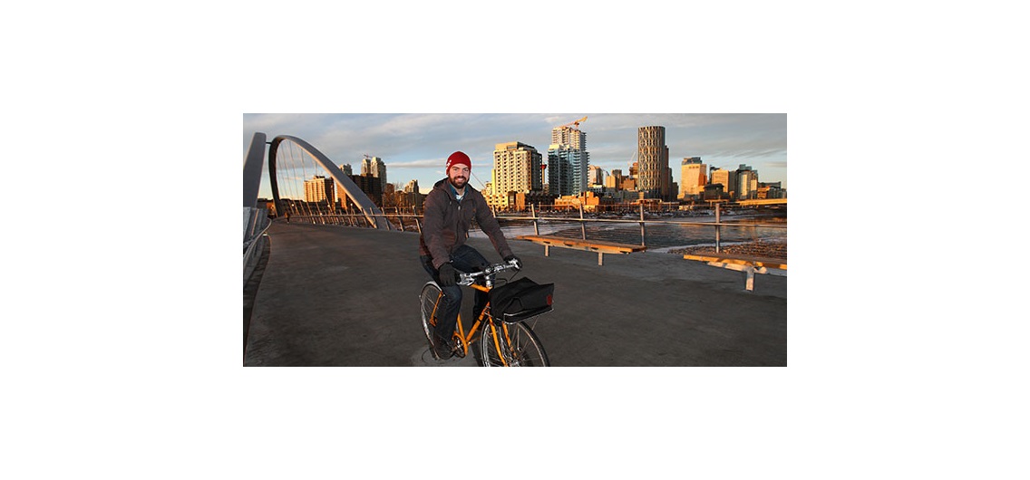Bike Calgary president Agustin Louro, pictured on the St Patricks Island connector bridge in East Village, believes cycling infrastructure needs to be improved before a bike-share system is viable in Calgary. Photo by Wil Andruschak/For CREB®Now