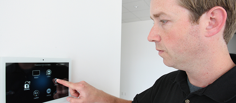 Automated lighting control allows homeowners to shave costs off their monthly energy bills, said Ryan Lowe, owner and senior project manager at Progressive Home Automation in Calgary. Photo by Wil Andruschak/For CREB®Now