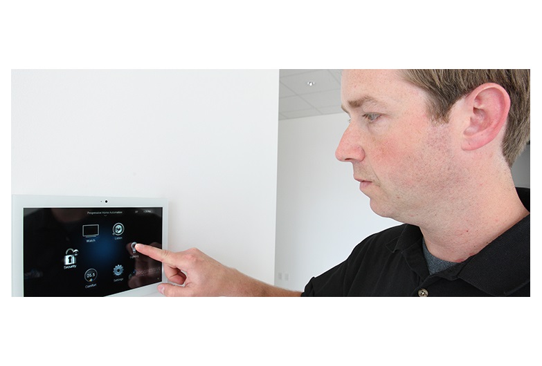 Automated lighting control allows homeowners to shave costs off their monthly energy bills, said Ryan Lowe, owner and senior project manager at Progressive Home Automation in Calgary. Photo by Wil Andruschak/For CREB®Now