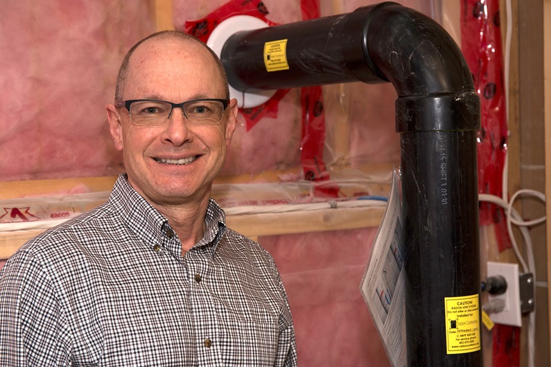 Radon levels in Darcy Undseth’s home dropped quickly once the remediation system was installed. Photo by Tyler Klinkhammer / For CREB®Now