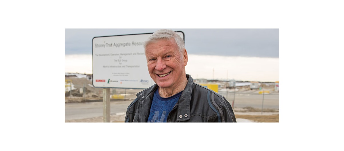 Local Rocky View County resident Mike Edwards stands next to the Stoney Trail Aggregate Resource gravel pit. Edwards says he and his neighbours are unhappy with the county’s proposed framework for gravel pit operations in the area. Photo by Adrian Shellard/For CREB®Now