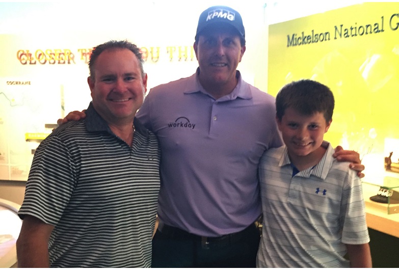 Brian Haydamack (left) and his son Zachary (right) with PGA Tour star Phil Mickelson – who designed the signature golf course that will eventually flank the community of Harmony.
Courtesy Brian Haydamack 