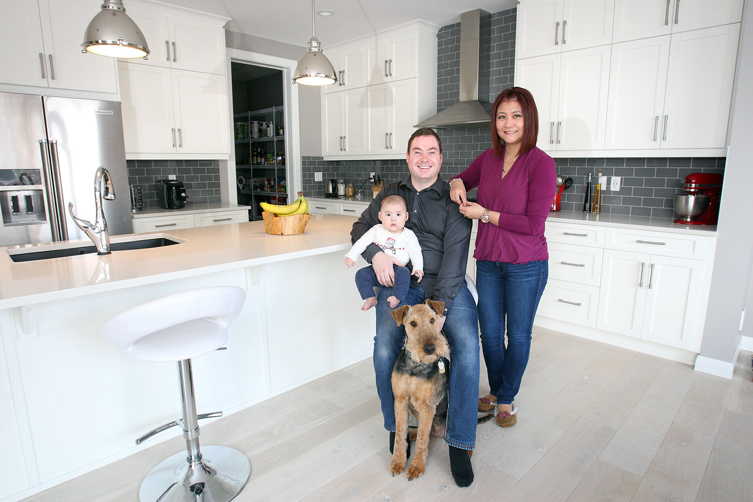 Vera and Jared Totland, who relocated from Calgary to Chestermere are enjoying the water and the small-town feel. Photo by Wil Andruschak / For CREB®Now