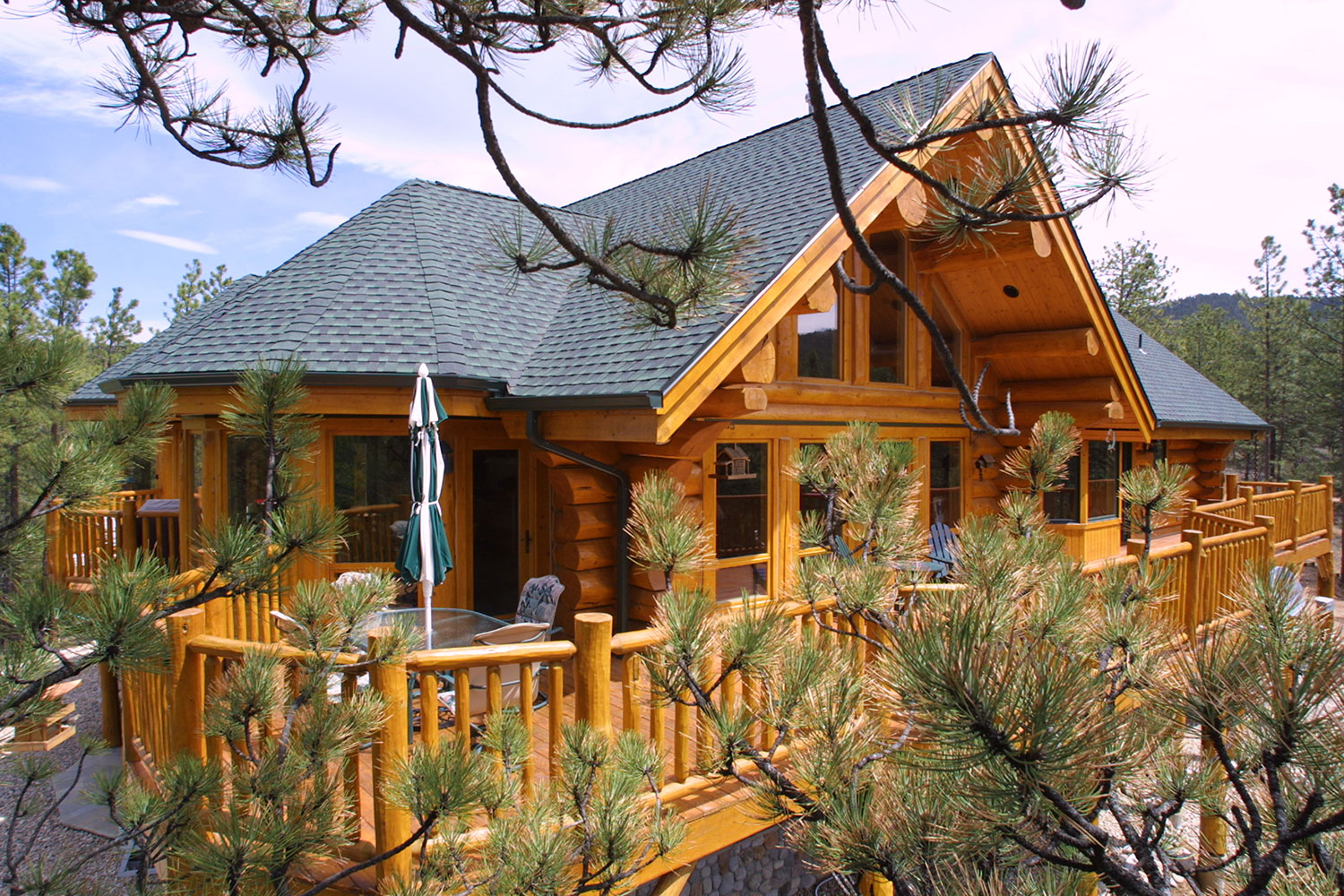 The rustic aesthetic of timber-frame and log homes is a perfect match for the natural backdrop of acreage properties.
Courtesy Moose Mountain Log Homes Inc.