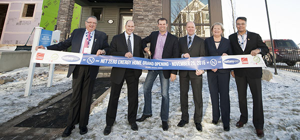 Mattamy unveiled its first net-zero home in Cityscape late last year. Pictured, from left, is Andy Goyda of Owens Corning Canada with Mattamy Homes representatives Don Barrineau, Brad Carr and Warren Saunders, as well as Donna Moore of the Canadian Home Builders’ Association - Calgary Region and 
Salvatore Ciarlo of Owens Corning Canada.