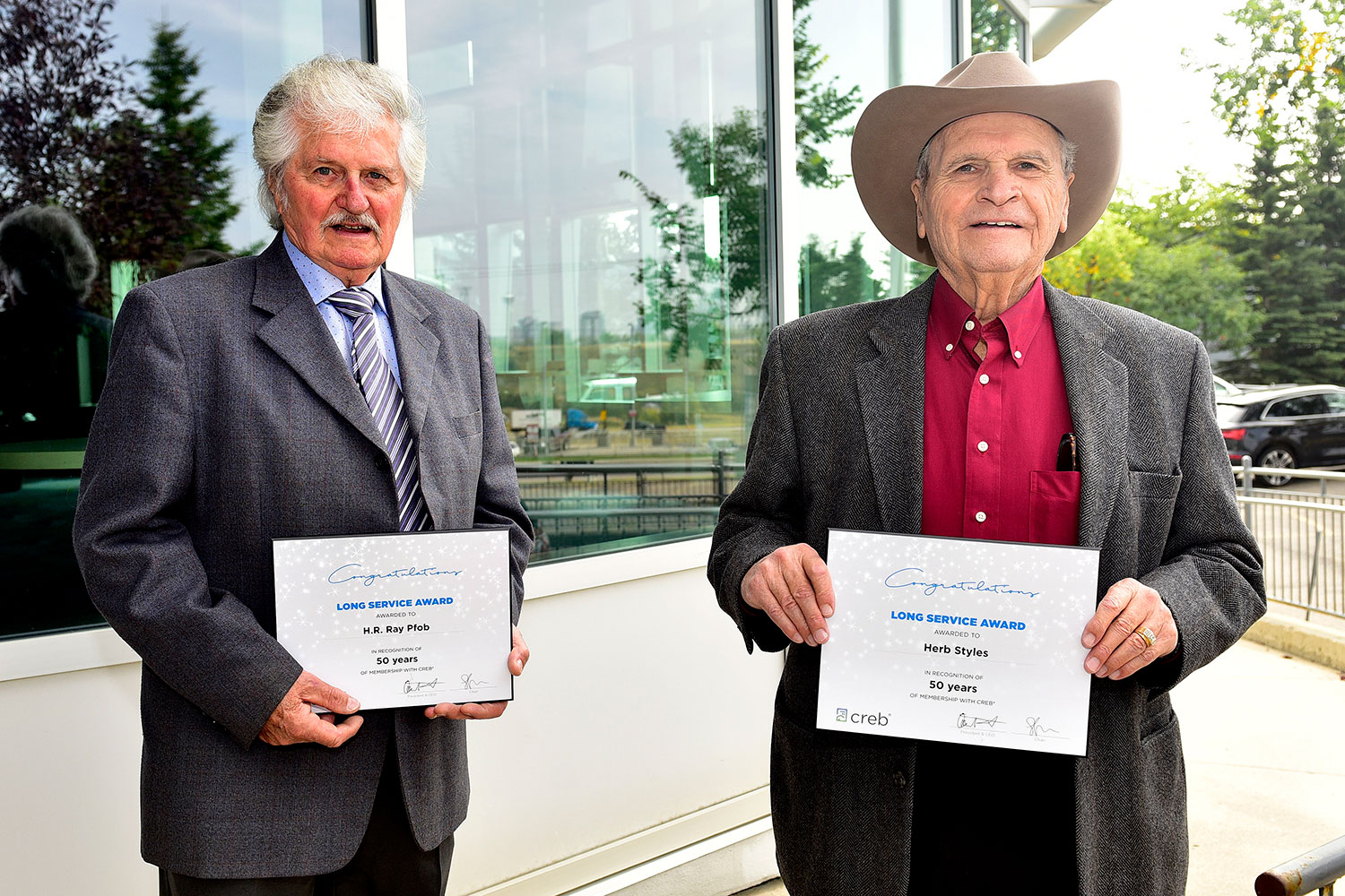 Ray Pfob (left) and Herb Styles are both celebrating 50 years as CREB® REALTORS® in 2020.
Terence Leung / CREB®Now