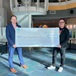 CREB® REALTOR® Community Foundation Chair Murray Scotton (left) and Calgary Seniors' Resource Society Fund Development Officer Derek Moser. (Cody Stuart / CREB®Now)